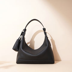 curved hobo bag with coin pouch detail – SIENAV