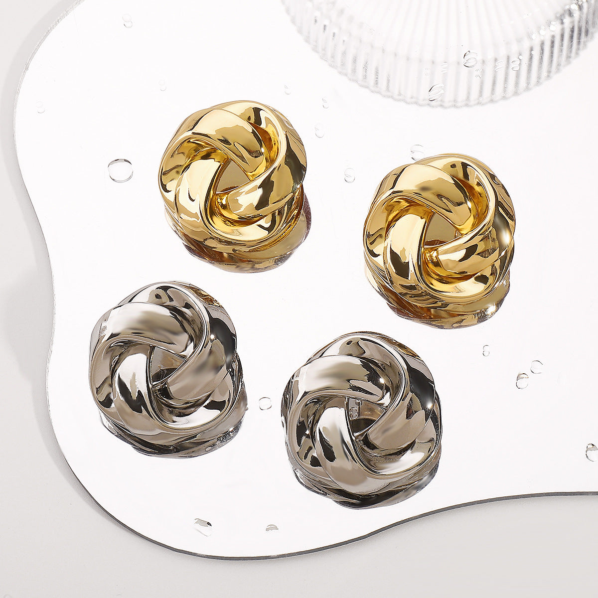 twisted dome stud earrings with polished finish – SELMAR