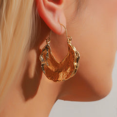 Molten crescent hoop earrings with textured finish – Zolix
