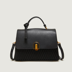 Pleated leather handbag with metal clasp - Lero
