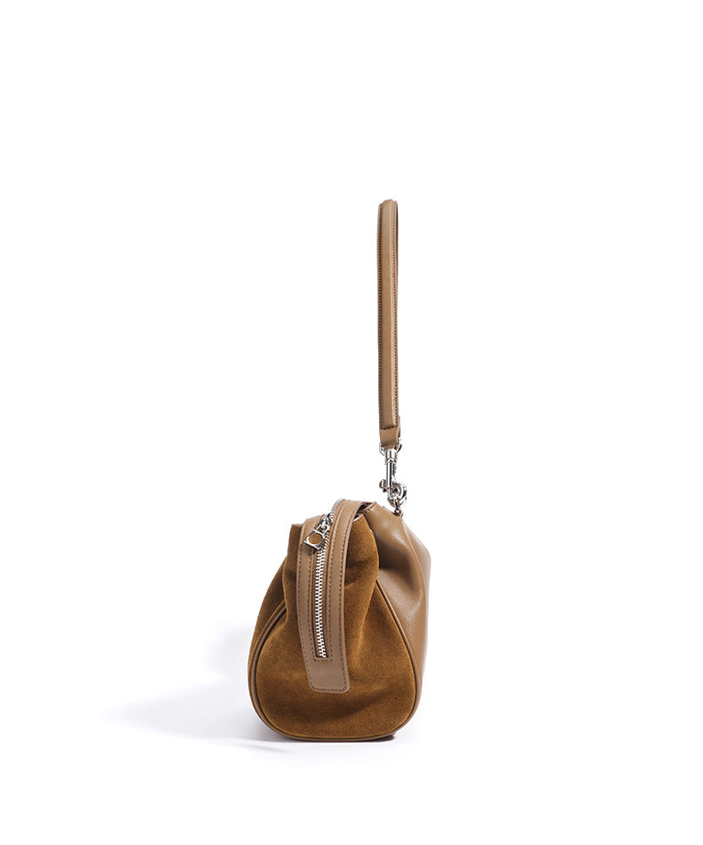 suede shoulder bag with curved zipper detail – TERRA