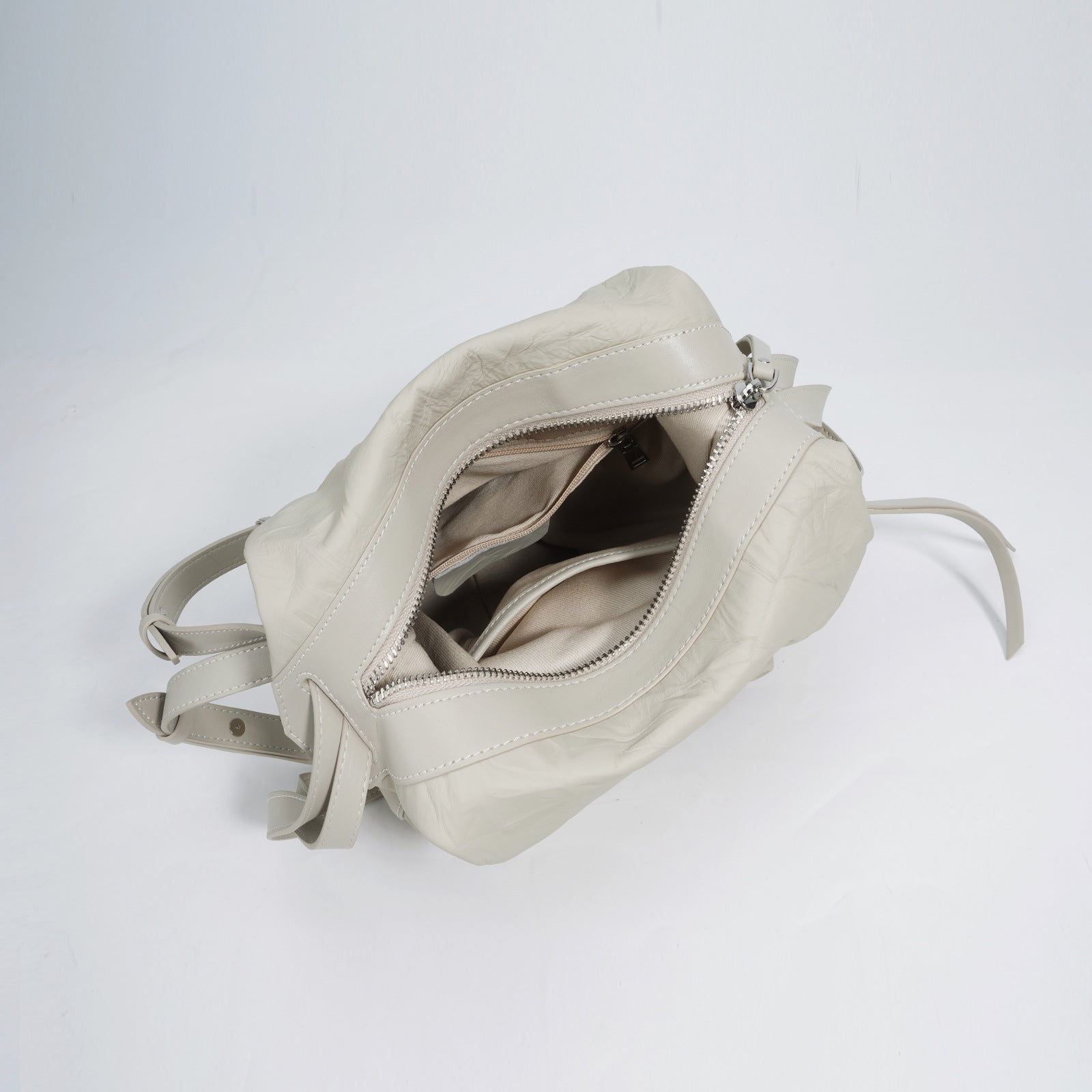 crinkled leather backpack with loop top handle - NOVLA