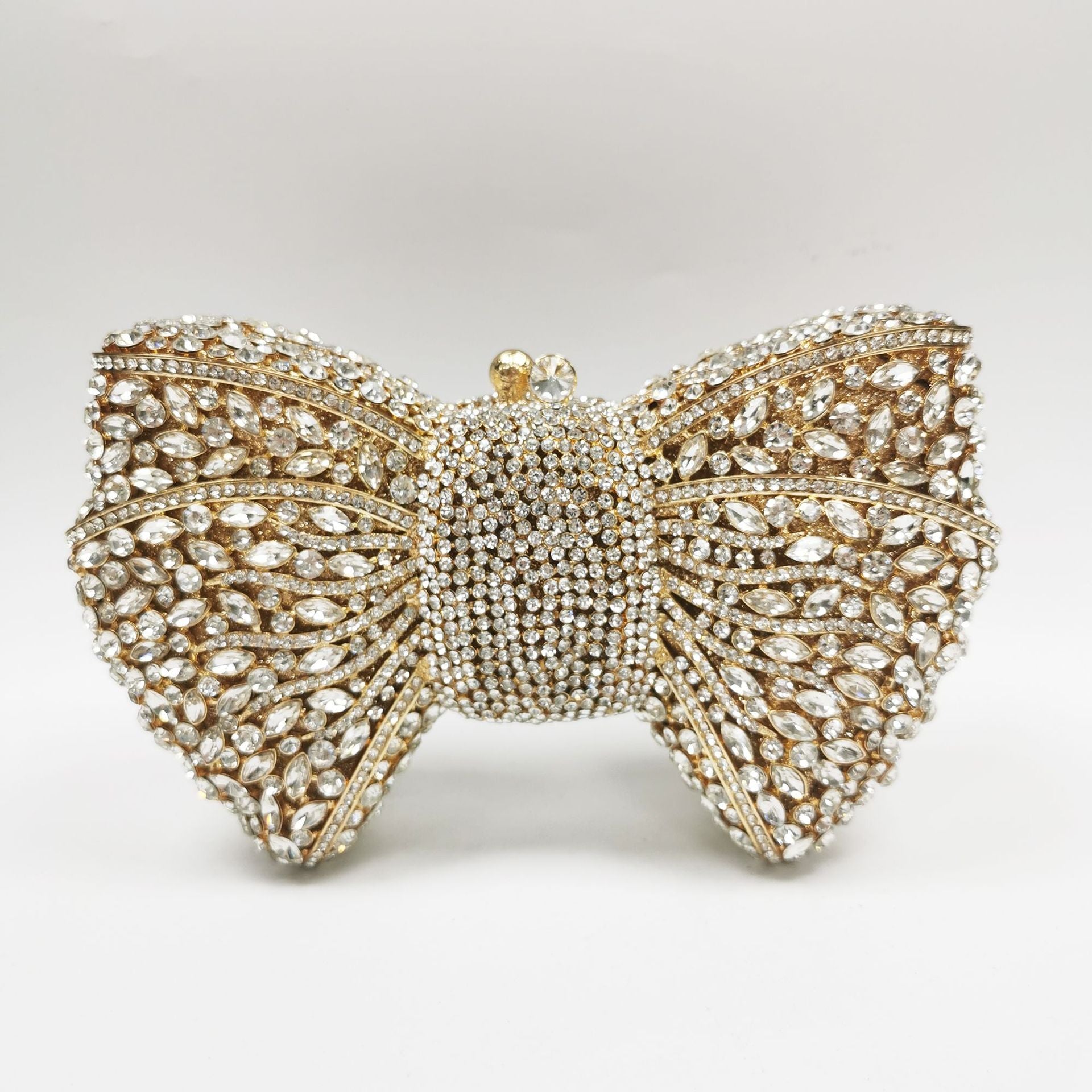 crystal bow-shaped clutch with emerald stones - Efrosini