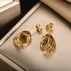 sculptural gold hand earrings with modern drop stud – MANO