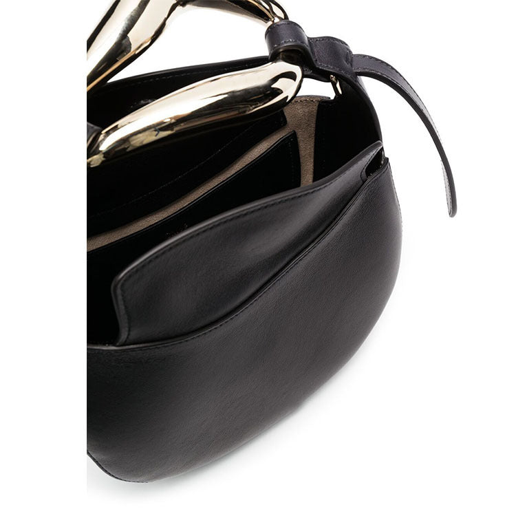 sculptural-handle saddle bag in tan leather – ARIS