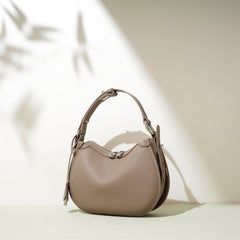 textured leather crescent bag with top handle - LAYLONA