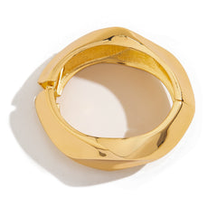 sculptural gold bangle bracelet with folded edge – NOVIA