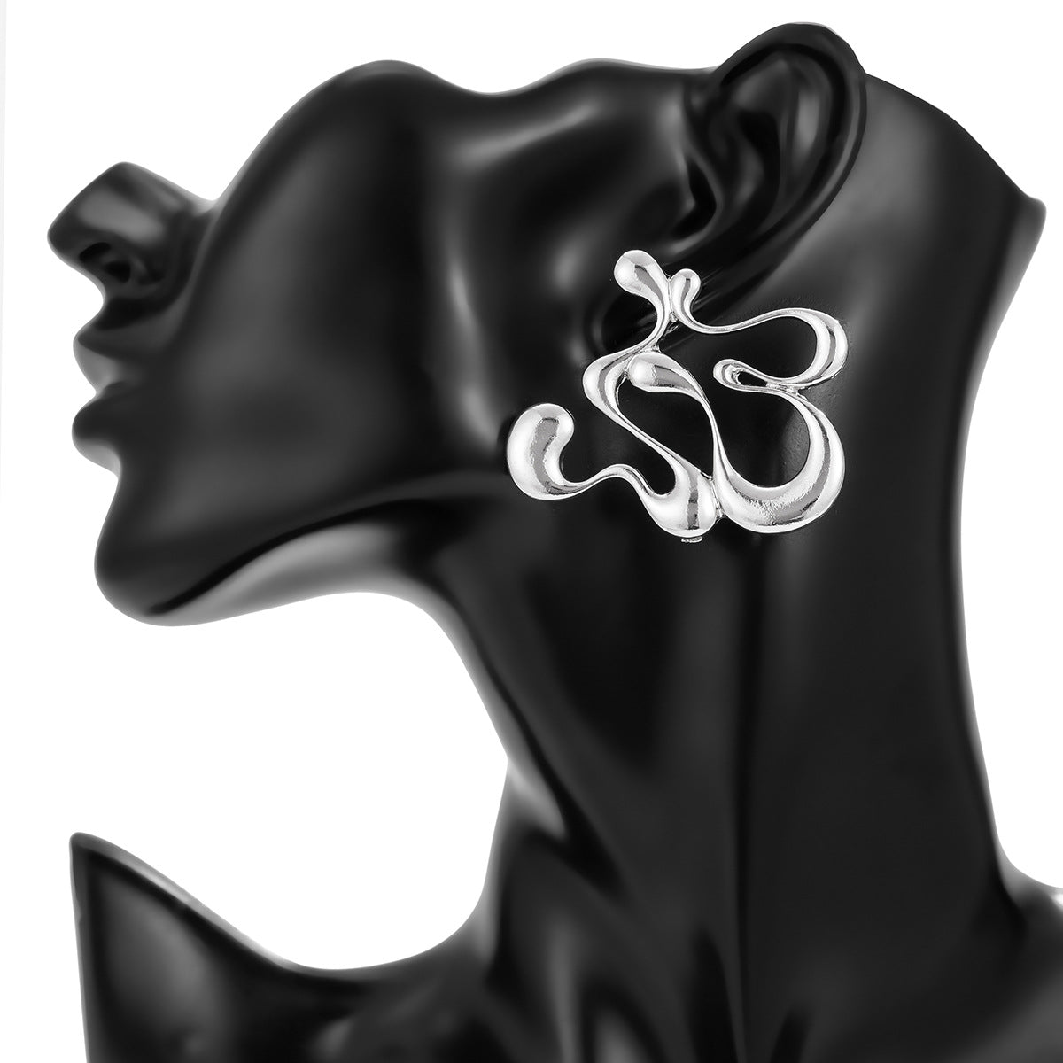 Sculptural drip-shaped earrings with statement curves – Lunimak