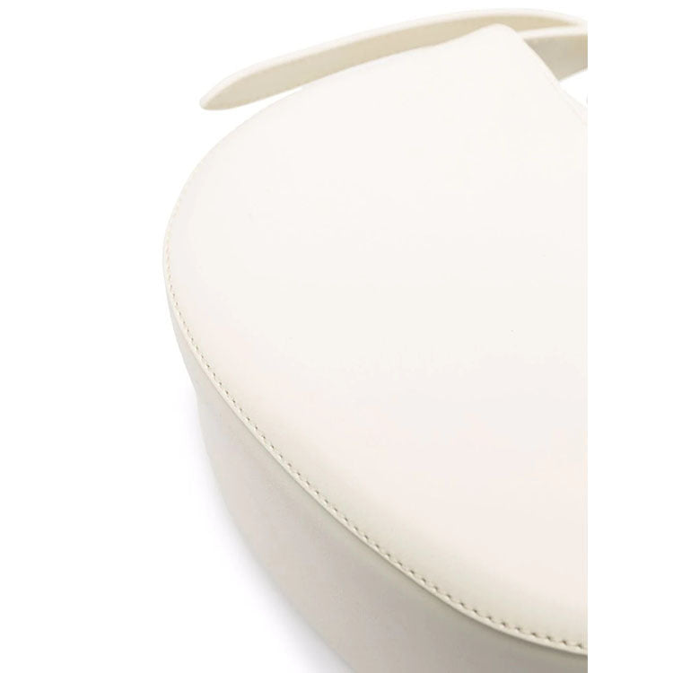 sculptural-handle saddle bag in tan leather – ARIS