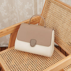 two-tone flap handbag with top handle – CLAIRE