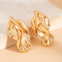 Molten wave stud earrings with organic contours - Roni