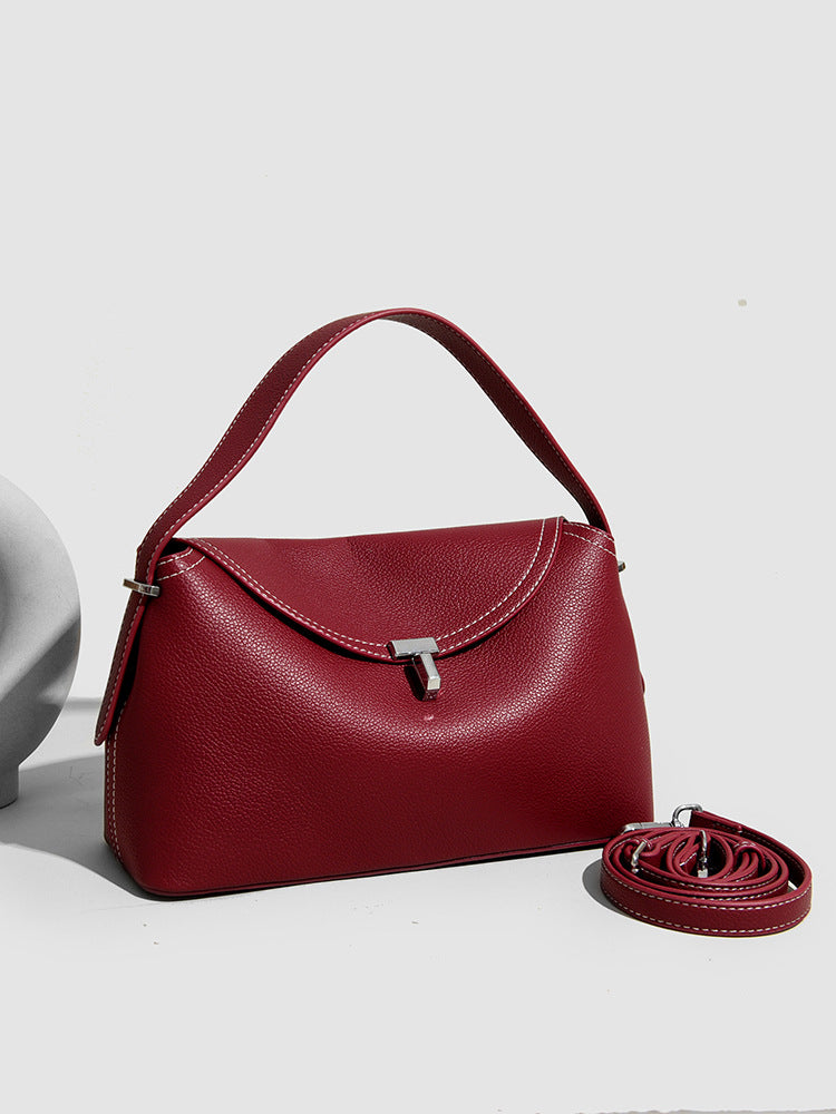 curved flap handbag with contrast stitching – TESSA