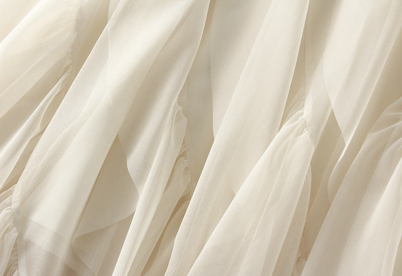Asymmetrical ruffled mesh skirt with waterfall layers – Apilu
