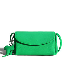 textured flap crossbody bag with elephant charm - NOMA