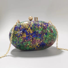 Oval marble clutch with gold clasp and chain handle - Zigru