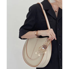 crescent saddle bag in textured leather – SANDRA