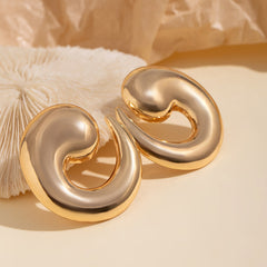 Swirl-shaped stud earrings with glossy finish - Tondi