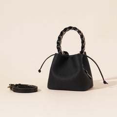 ivory pebbled leather bucket bag with braided top handle – CALISTA