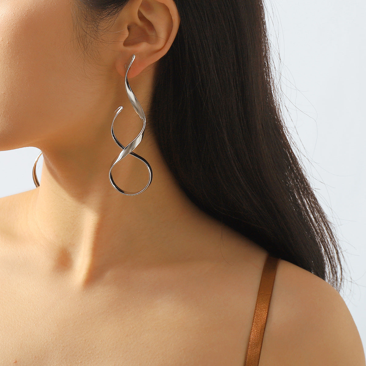 sculptural twist drop earrings – LUXA