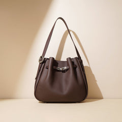 textured leather bucket bag with turn-lock strap – CAMELIA