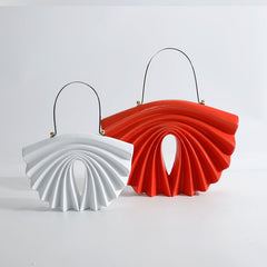 culpted accordion shell bag with metal top handle – LUCIDA