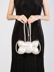Bow-shaped pearl-embellished bag with chain strap - Lizzry