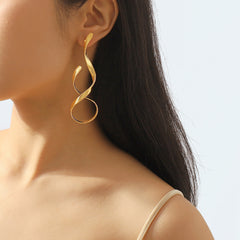 sculptural twist drop earrings – LUXA