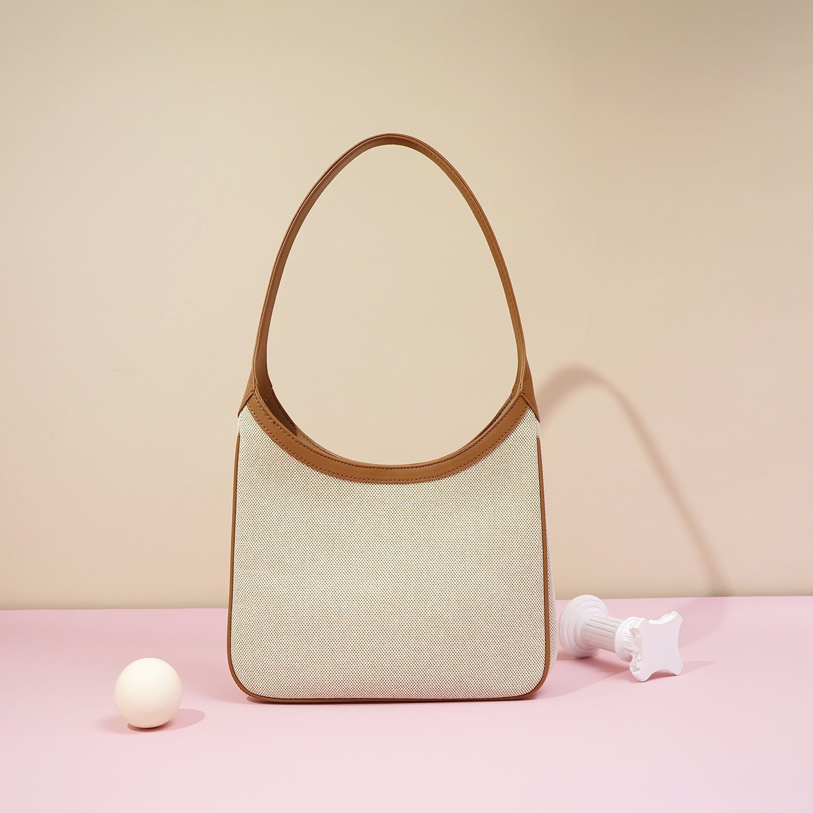structured canvas shoulder bag with leather trim - NOELZE