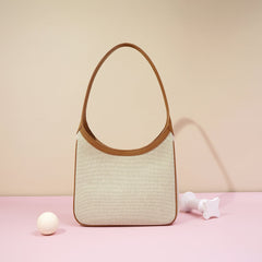 structured canvas shoulder bag with leather trim - NOELZE