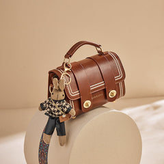 pearl-trim leather satchel with double clasp & bunny charm – COCOA