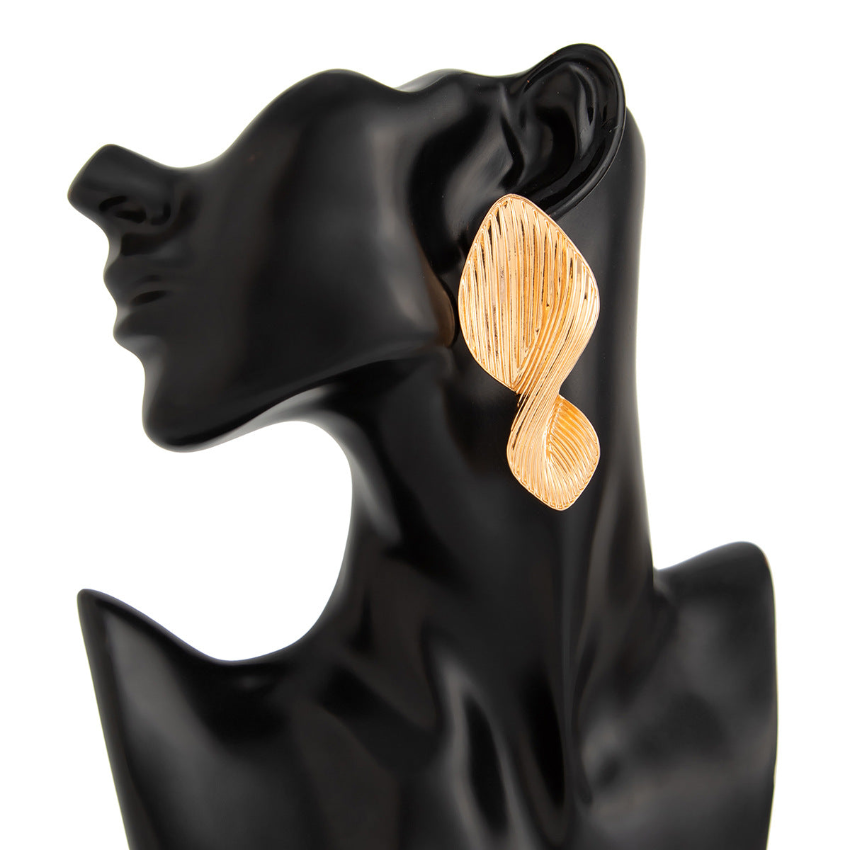 Textured leaf drop earrings with organic twist - Azina