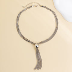 Multi-strand chain necklace with metallic tassel pendant - Olitu