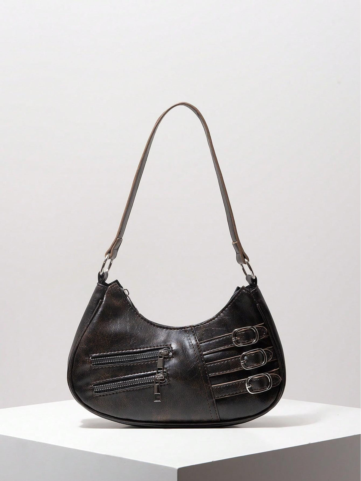 Crescent shoulder bag with buckle and zipper detail - Rimna