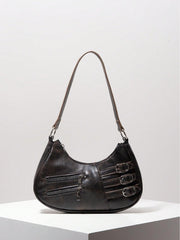 Crescent shoulder bag with buckle and zipper detail - Rimna