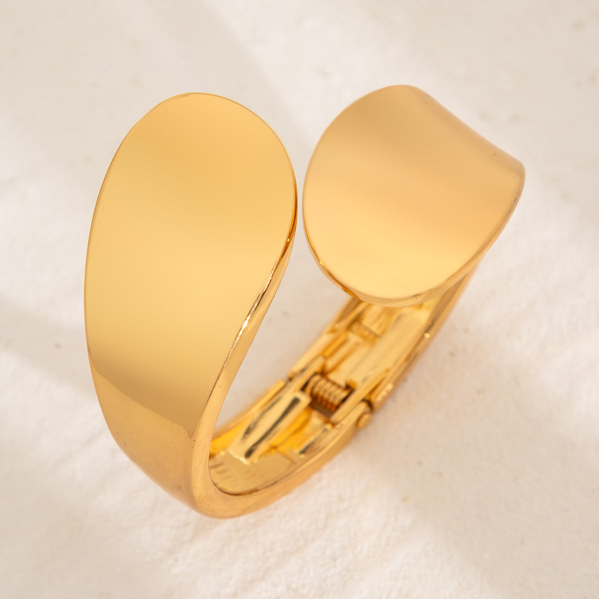 smooth gold cuff bracelet with curved teardrop ends – SOLA