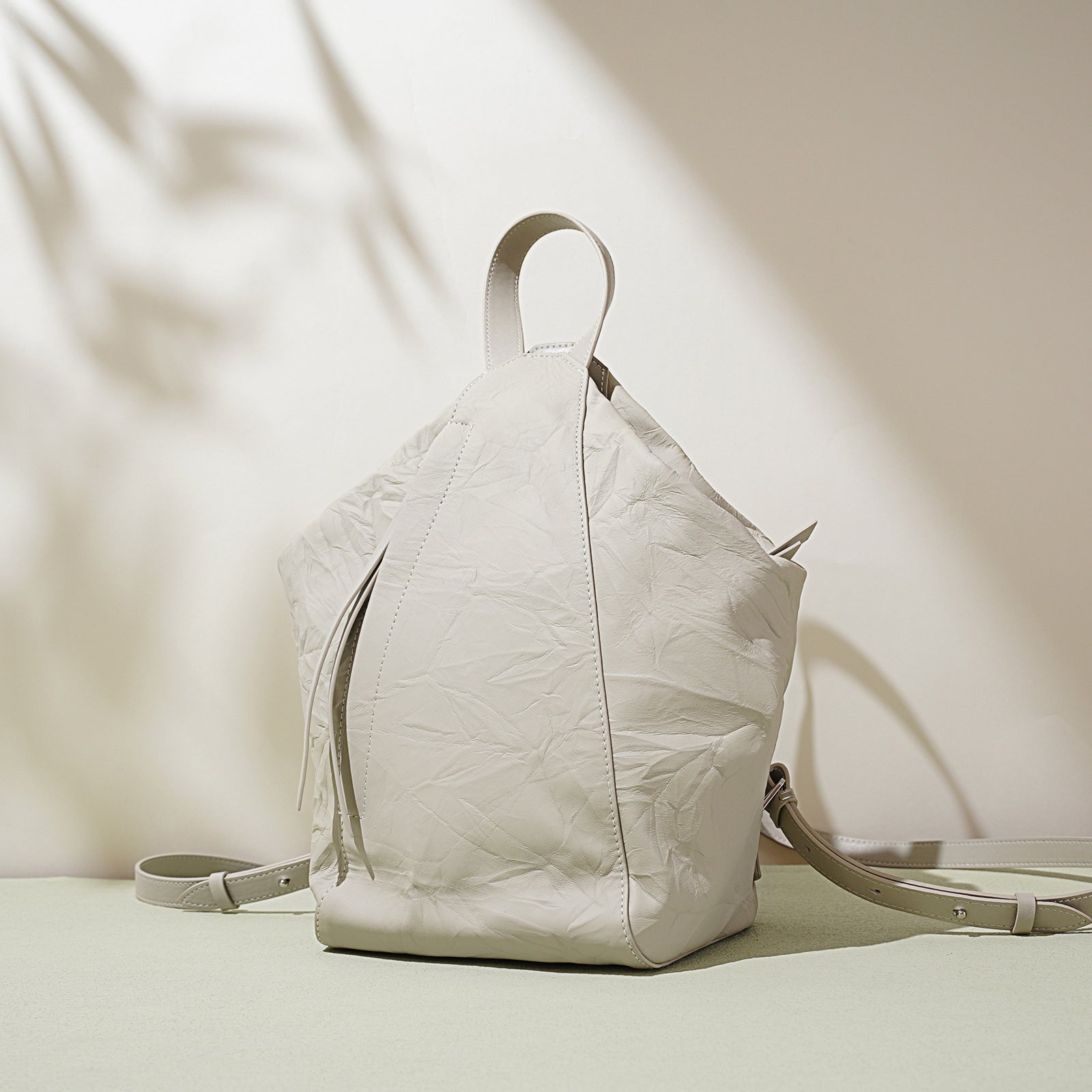 crinkled leather backpack with loop top handle - NOVLA