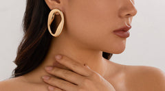 Organic oval earrings with sculpted curves – Zandi