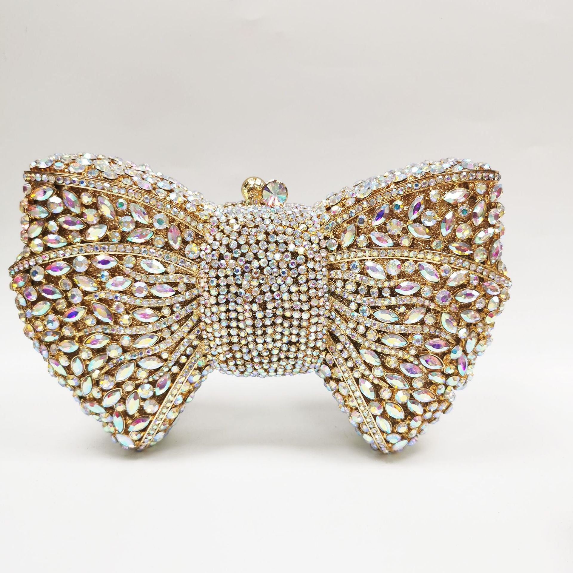 crystal bow-shaped clutch with emerald stones - Efrosini