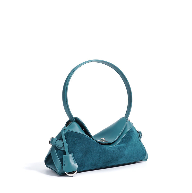 curved suede shoulder bag with flap closure – AURA