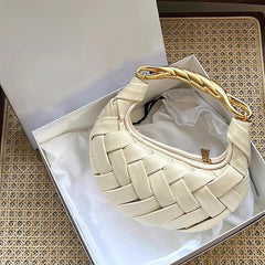 woven crescent bag with sculpted gold handle – AURELIA