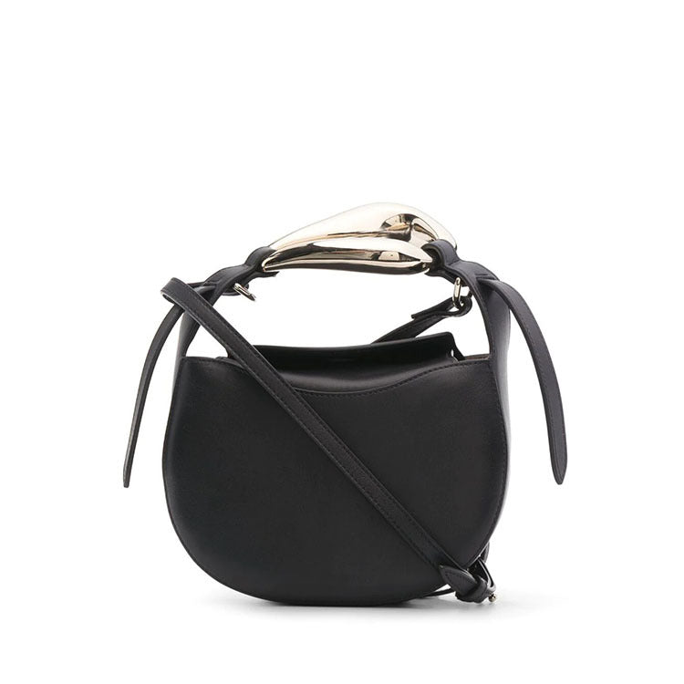 sculptural-handle saddle bag in tan leather – ARIS