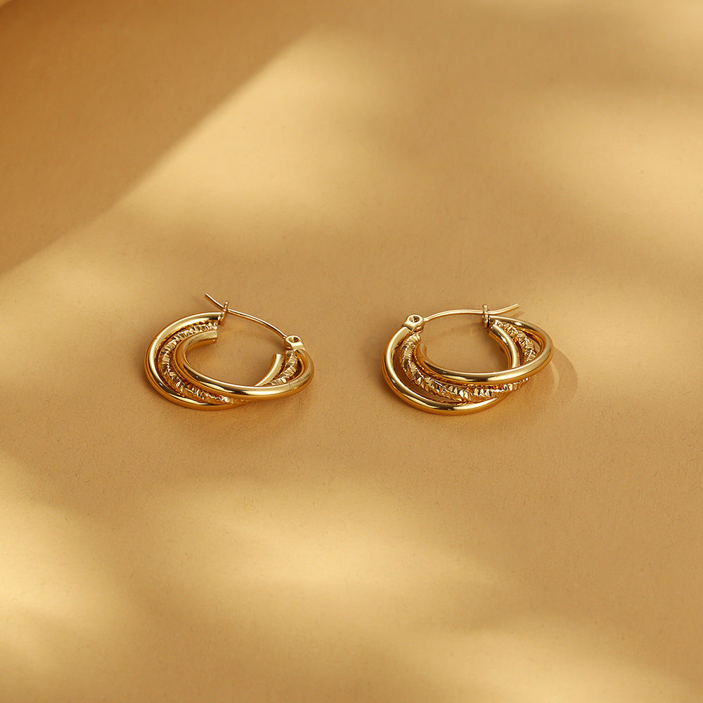 Dual-layer textured hoop earrings with engraved detail – Akoma