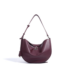 crescent moon shoulder bag with curved silhouette - STELZA