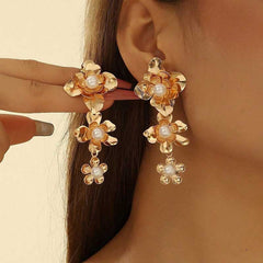 floral hoop earring with blue crystal centers – AURELIA