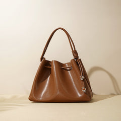 glossy drawstring shoulder bag with knot detail – SIENNA