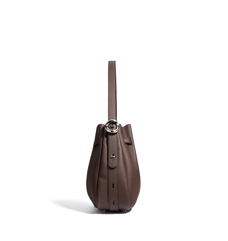 textured leather bucket bag with turn-lock strap – CAMELIA
