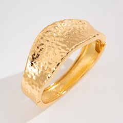 hammered gold bangle bracelet with tapered edges – VIERA