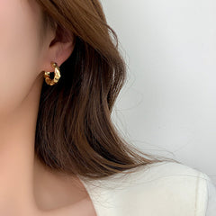 Chunky molten hoop earrings in hammered metal finish - Luxana