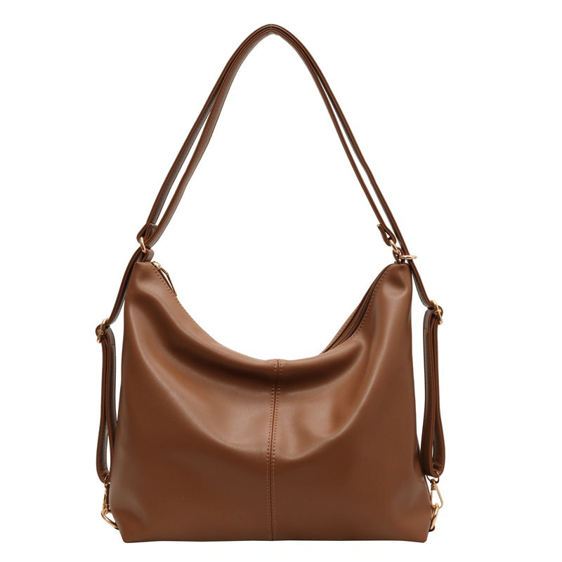 slouchy shoulder bag in black faux leather – ARYA