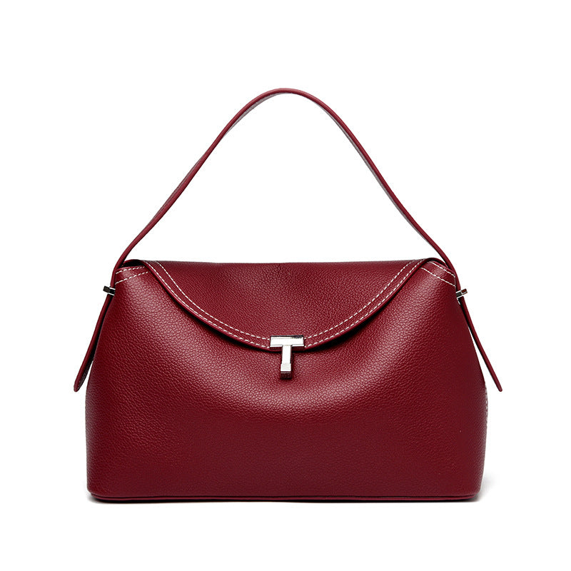 curved flap handbag with contrast stitching – TESSA